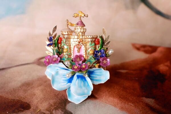 A blue flower with a castle on it