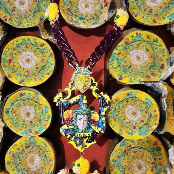 A colorful necklace and many yellow plates