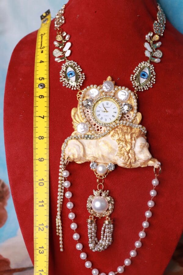 A large necklace with a clock on it