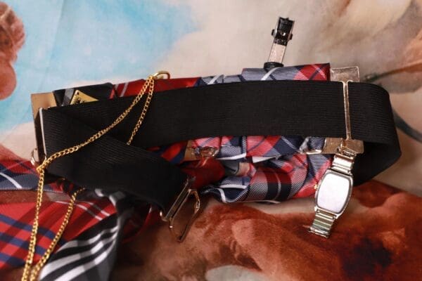 A close up of a bag with a watch on it