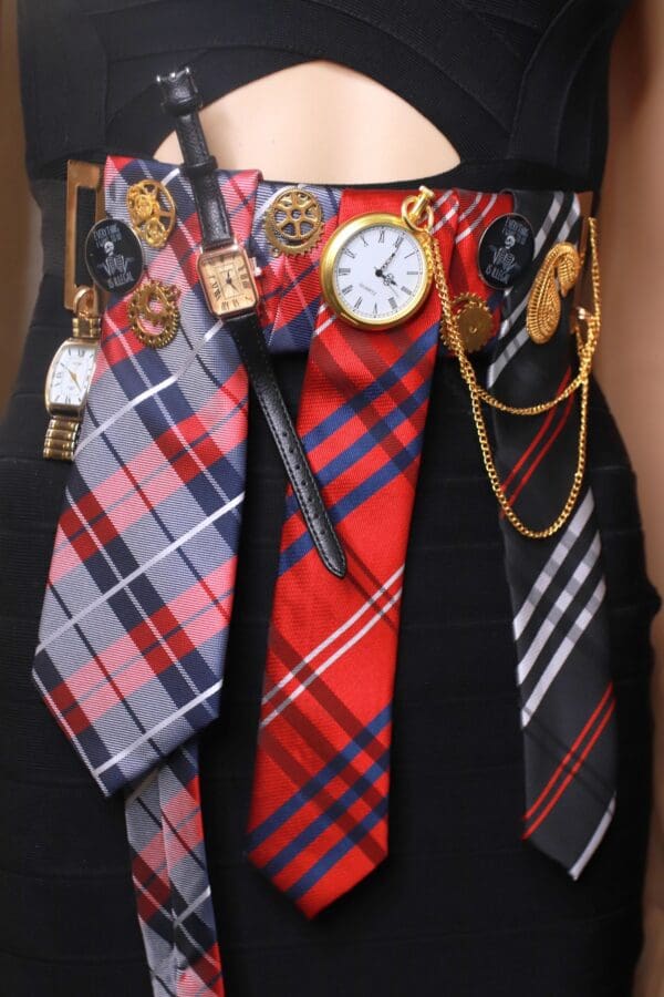 A man wearing many ties with different designs.