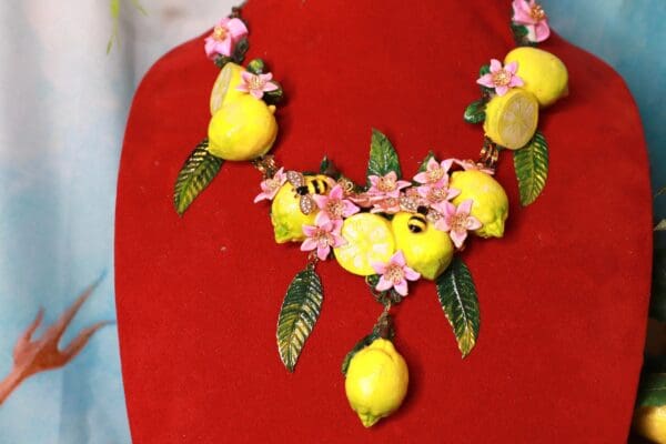 A red chair with lemons and flowers on it