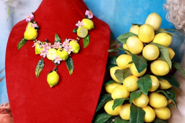 A red dress and lemons are on display.