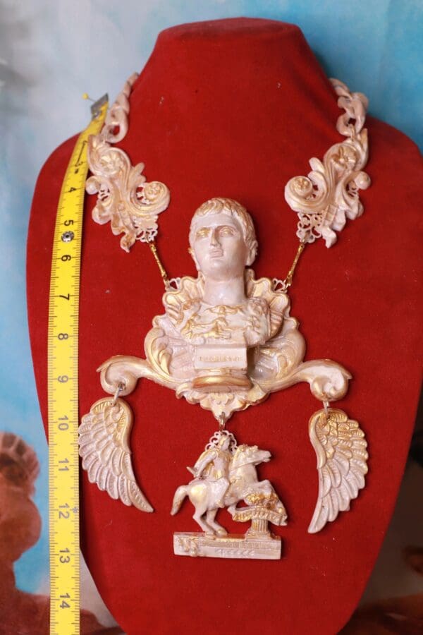 A red chair with a large necklace and a ruler
