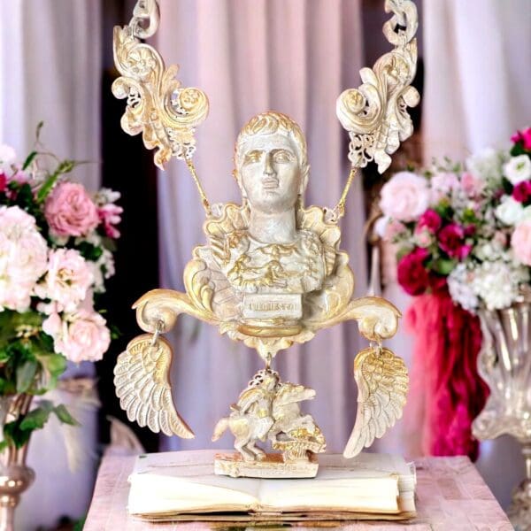 A statue of a man with flowers in the background.