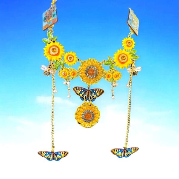 A pair of sunflowers and butterflies are hanging from the side of a cross.