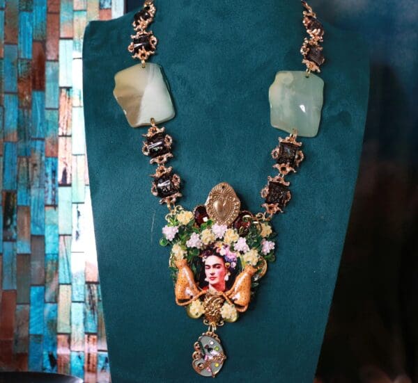 A necklace with a statue of an elephant on it