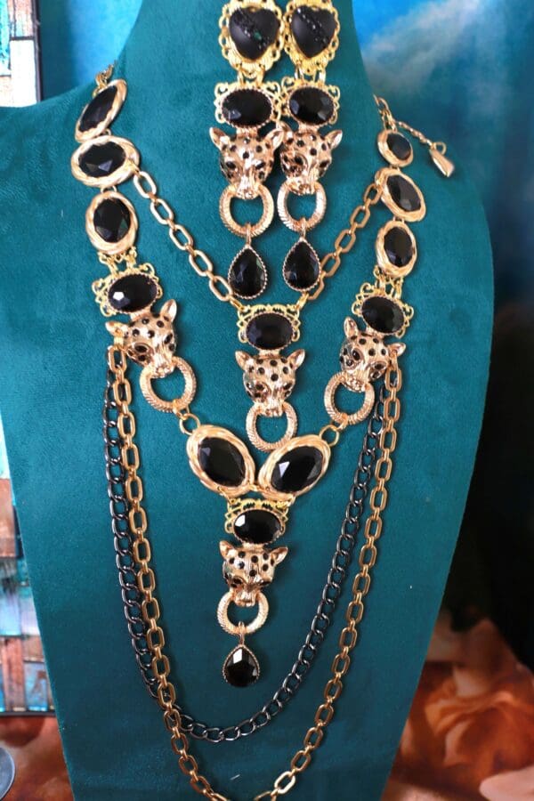 A display of jewelry on a stand.