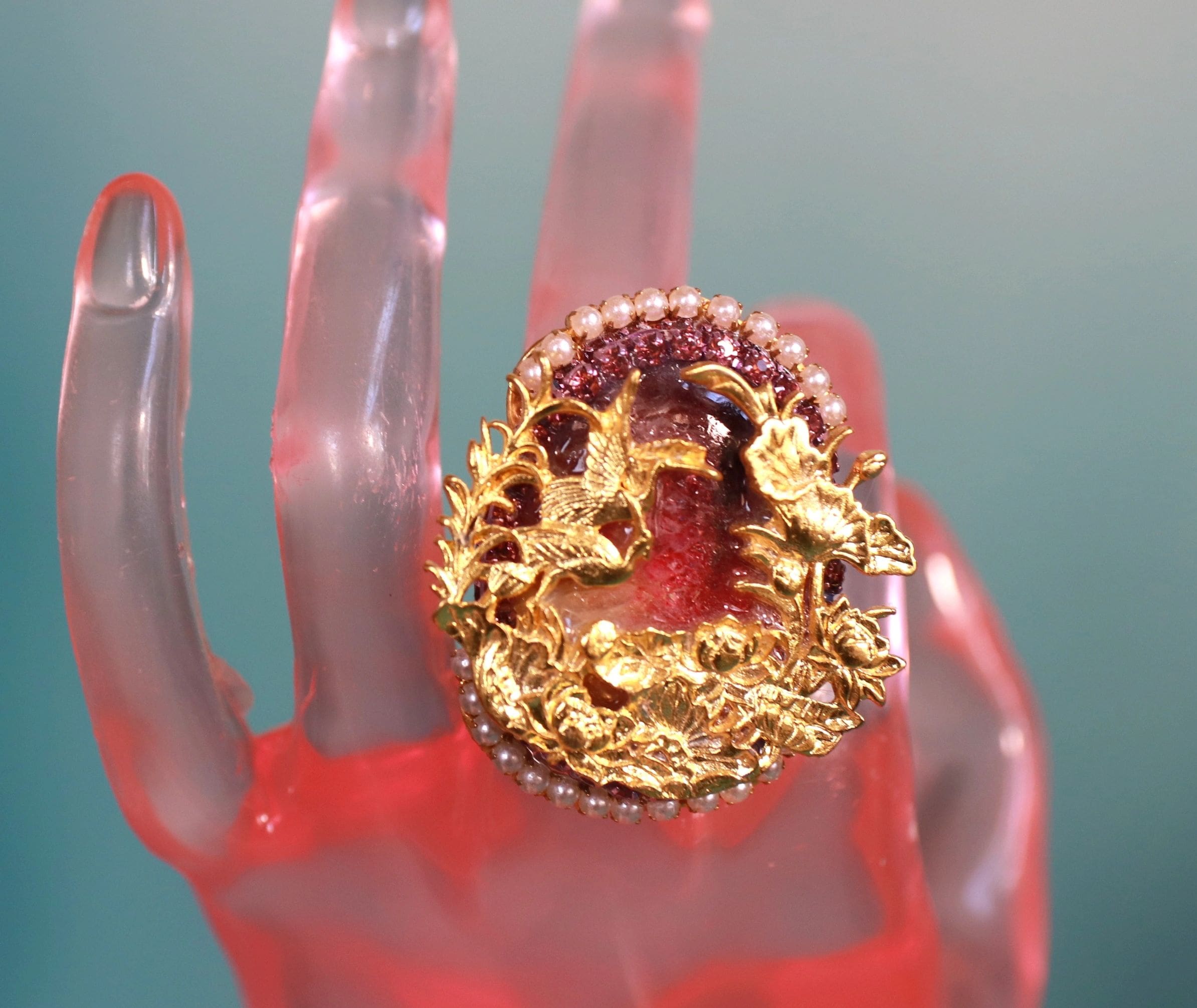 A hand with a ring on it's finger