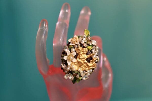 A hand with a ring on it's finger