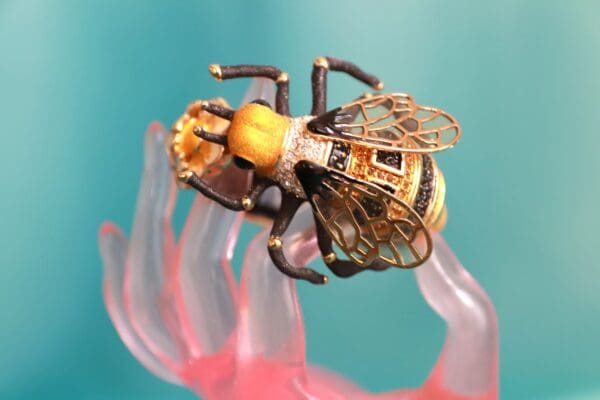 A bee sitting on top of some jellyfish