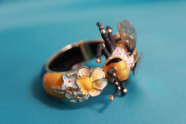 A close up of the side of a bee ring