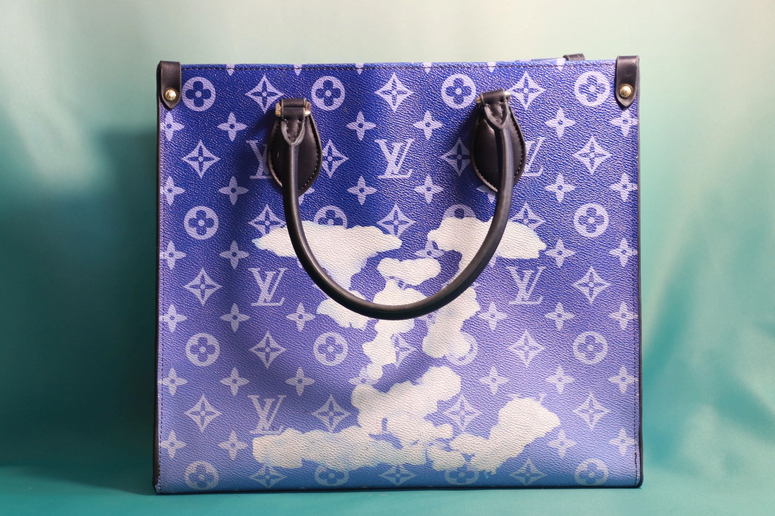 A blue bag with clouds on it