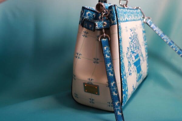 A close up of the strap on a purse