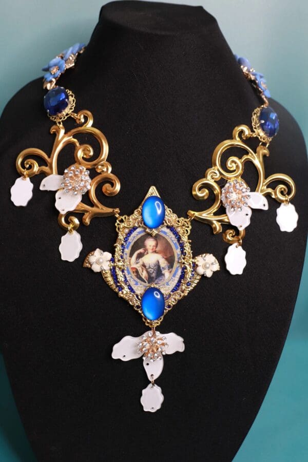 A necklace with a picture of jesus on it.