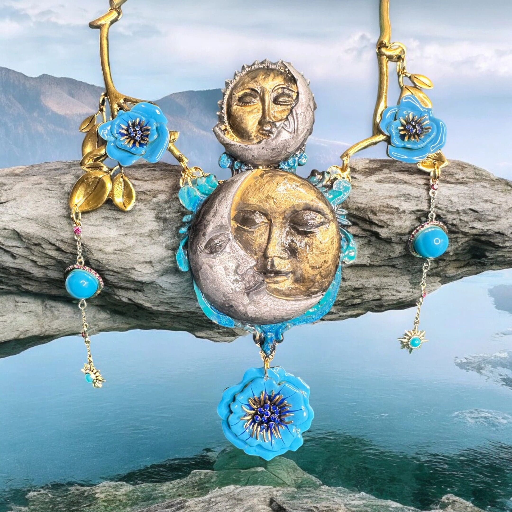 A necklace with a face and flowers on it