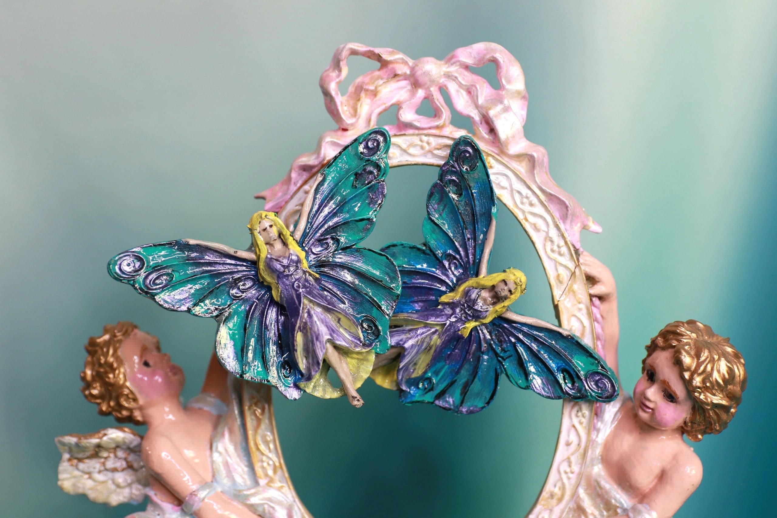 A pair of blue and purple butterfly earrings.