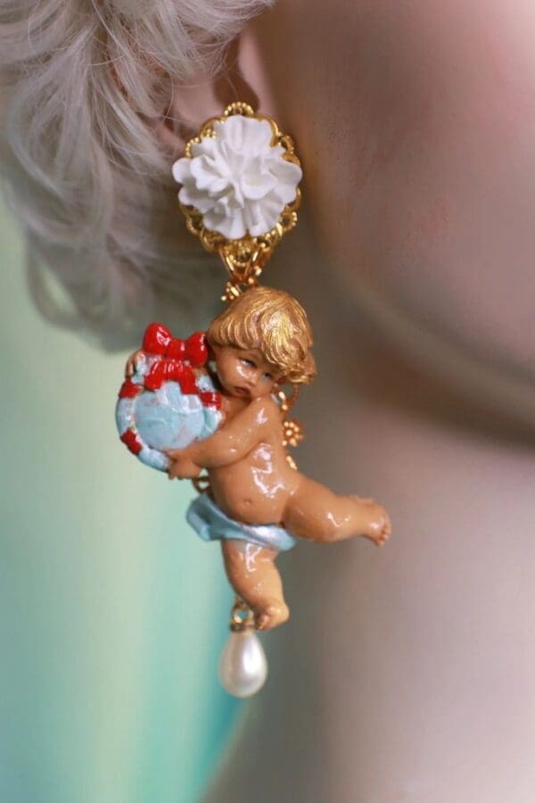 A close up of a person wearing earrings