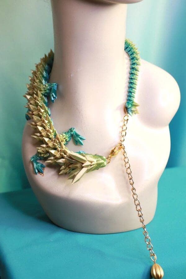 A necklace is shown on display in front of a white background.