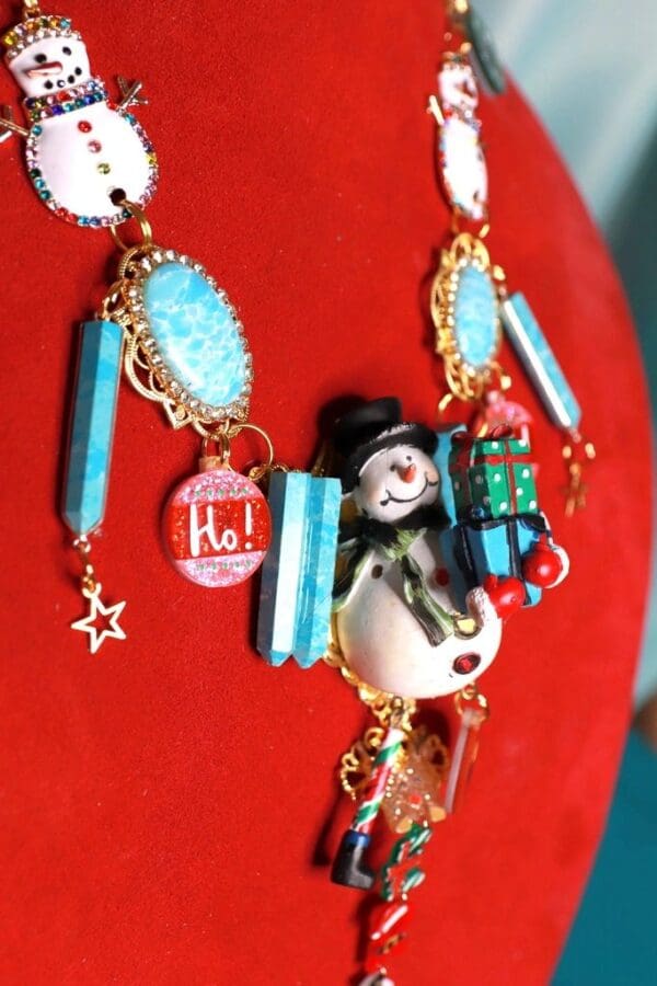 A red table with some jewelry on it