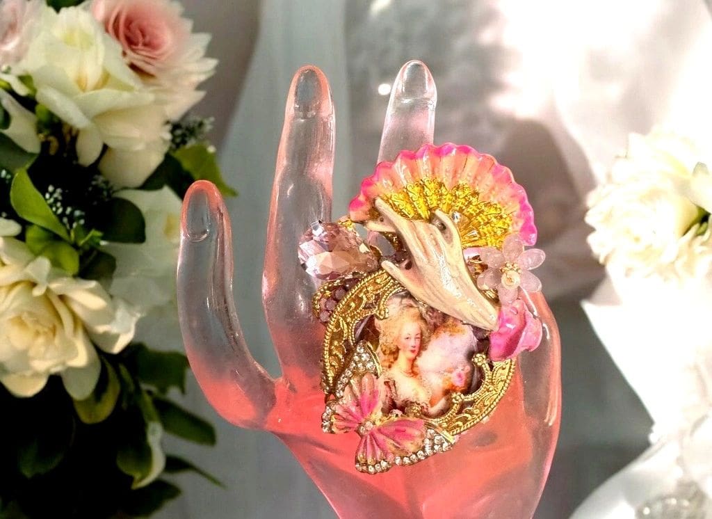 A hand with some flowers on it