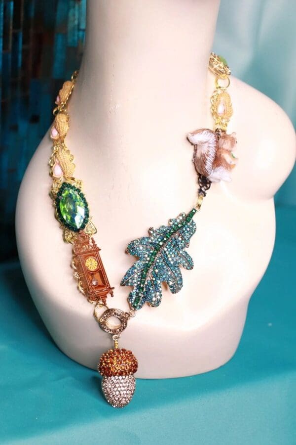 A necklace with leaves and beads on it