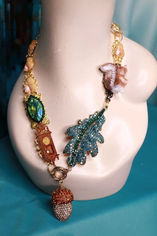 A necklace is displayed on the table.