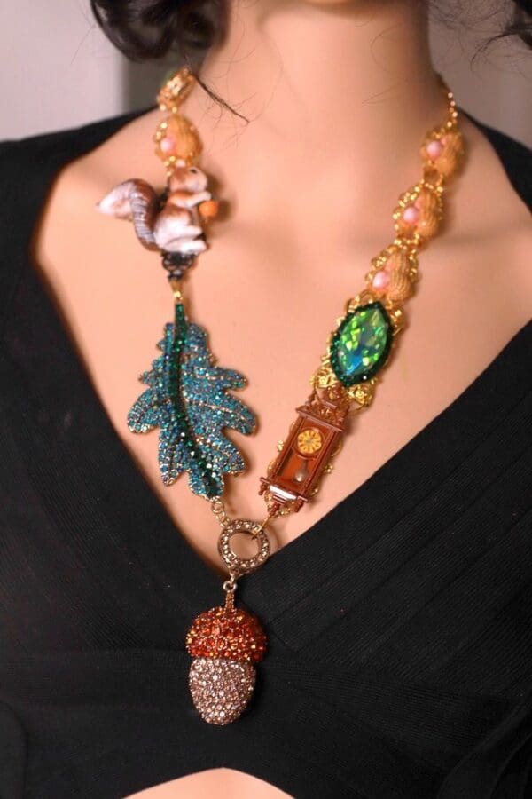 A woman wearing a necklace with various items.