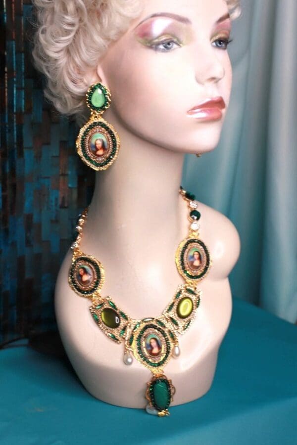 A woman wearing a necklace and earrings.