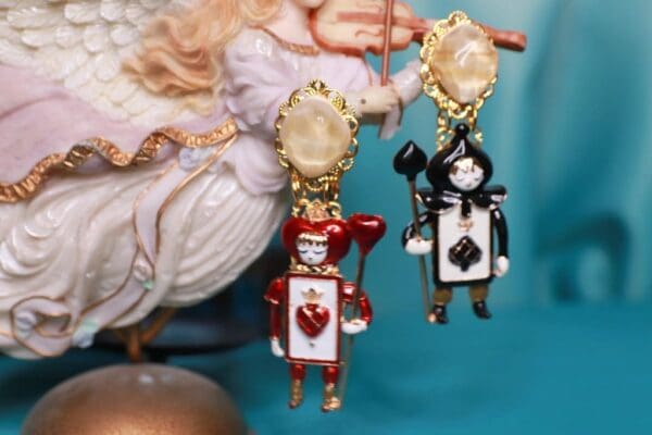 A couple of ornaments that are hanging on a wall