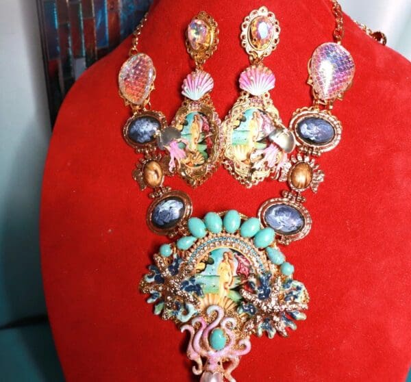 A red chair with some jewelry on it