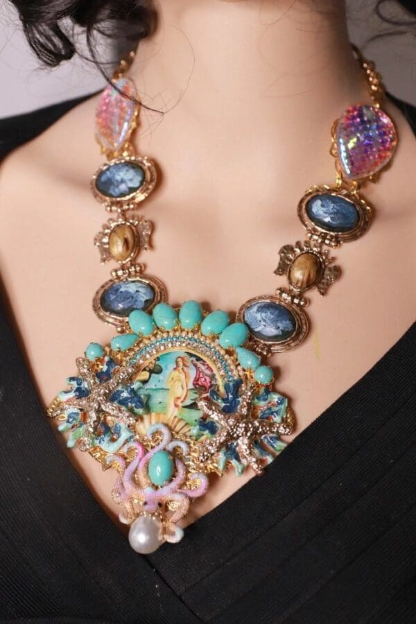 A woman wearing a necklace with many different colored stones.