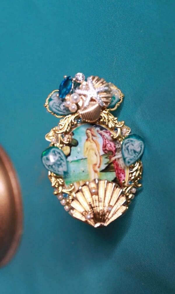 A close up of a shell with a painting on it