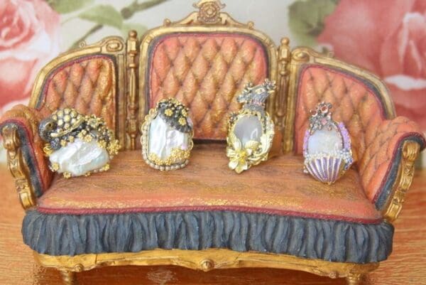 A group of four chairs sitting on top of a table.