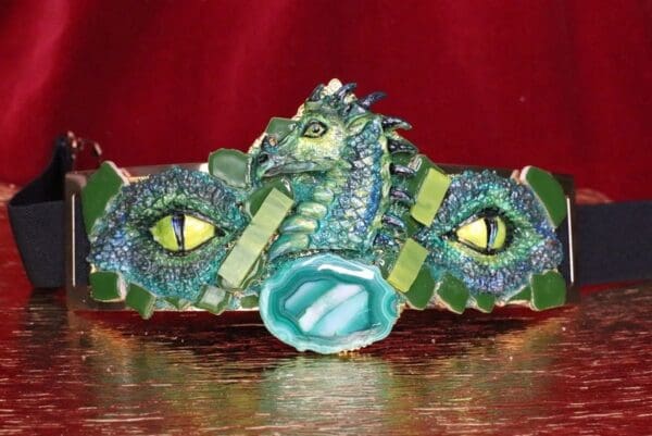 A dragon head with eyes made of glass.