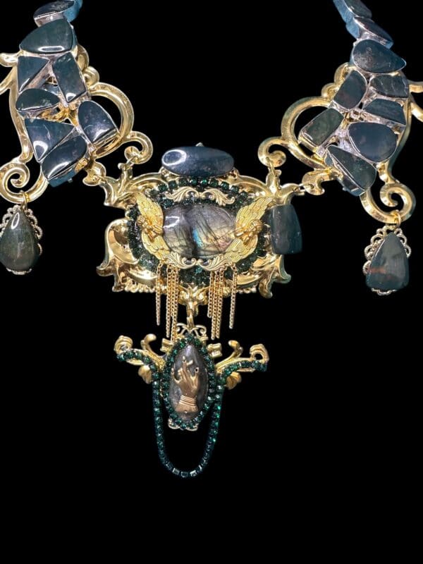 A close up of the chandelier with blue glass