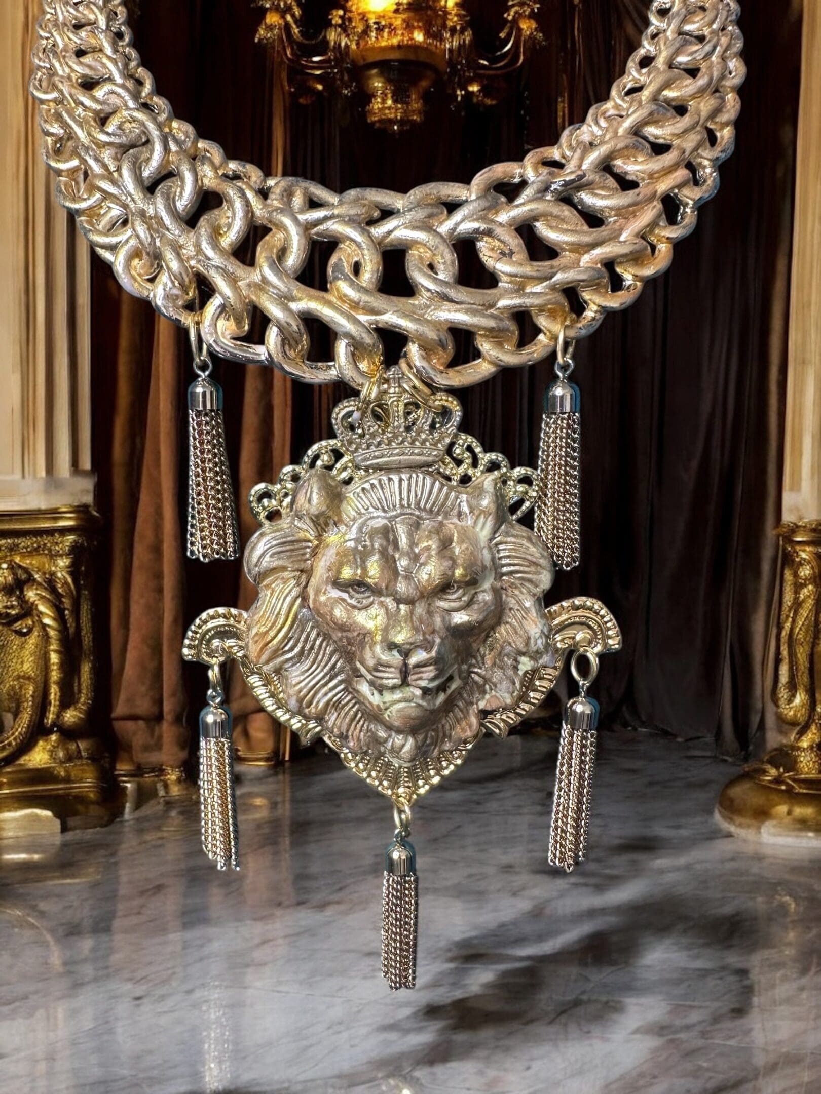 A large chain with tassels hanging from it.