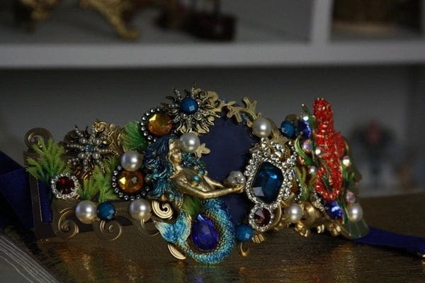 A close up of some jewelry on top of a table