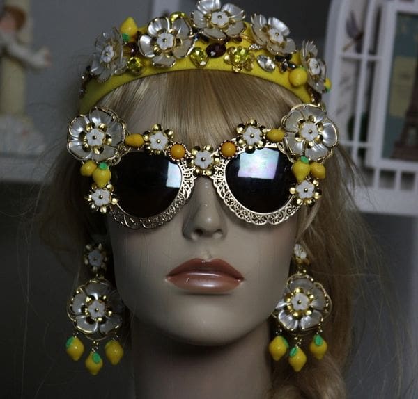 A mannequin wearing sunglasses and a tiara.
