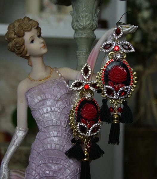 A doll wearing jewelry and a dress