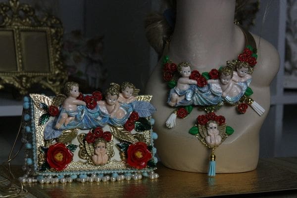 A close up of two figurines on top of a table.