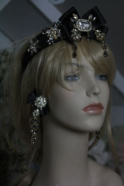 A mannequin with long blonde hair and a crown.