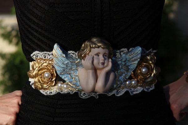 A close up of a small angel figurine