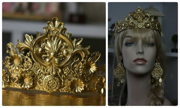A gold crown and a mannequin head