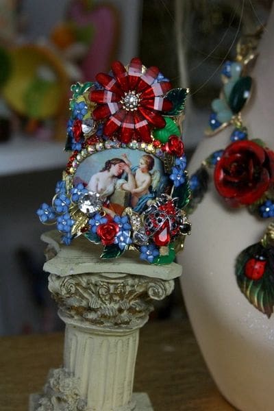 A close up of a statue with some jewelry