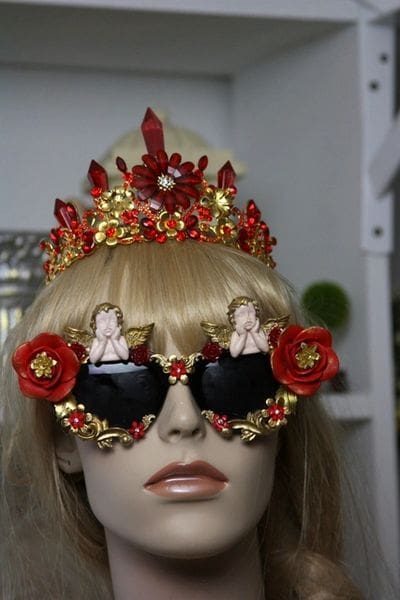 A mannequin wearing sunglasses and a tiara.
