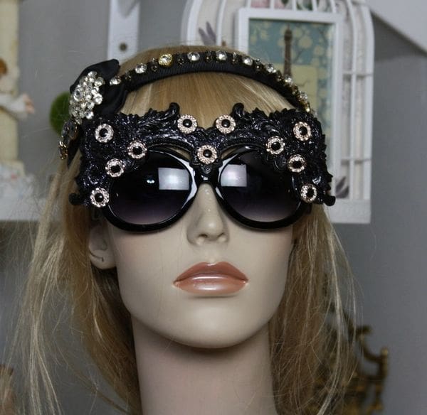 A mannequin wearing sunglasses and a headband.