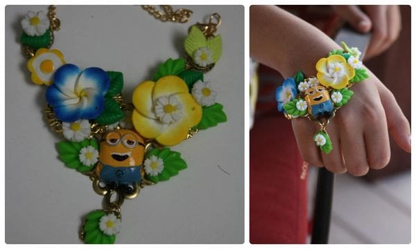 A close up of a necklace with flowers