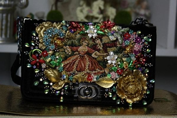 A close up of the front of a purse