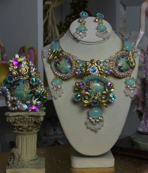 A necklace and earrings set on display in a store.